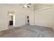 This main bedroom features vaulted ceilings, a ceiling fan, and an en suite bathroom at 9121 Harlequin Cir, Frederick, CO 80504
