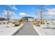 Community playground with play structure, swings, and covered seating at 9121 Harlequin Cir, Frederick, CO 80504
