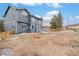 Large backyard featuring a patio, pergola, well-maintained lawn, and a charming wooden fence at 510 W Prestwick Way, Castle Rock, CO 80104