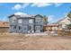 Wide view of the property's backyard, including a patio and pergola for outdoor enjoyment at 510 W Prestwick Way, Castle Rock, CO 80104