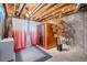 Unfinished basement featuring a cedar sauna, exposed ceiling, and concrete walls at 510 W Prestwick Way, Castle Rock, CO 80104