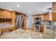 Well-equipped kitchen with stainless steel appliances, granite countertops, and wood cabinetry for a functional space at 510 W Prestwick Way, Castle Rock, CO 80104