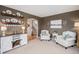 Comfortable living room with sophisticated decor, an open floor plan, and stylish furniture for a cozy retreat at 510 W Prestwick Way, Castle Rock, CO 80104