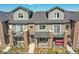 Beautiful townhouses feature brick accents, balconies, and a welcoming entrance at 5179 S Fairplay St, Aurora, CO 80015