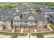 Desirable neighborhood showcases townhouses with brick accents, balconies, and inviting entrances at 5179 S Fairplay St, Aurora, CO 80015