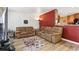 This cozy living room has comfortable seating and bright light at 8460 Corona St, Denver, CO 80229