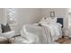 Cozy bedroom with natural light, stylish decor, and hardwood flooring for a comfortable retreat at 3055 Clermont St, Denver, CO 80207