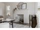 Close-up of the decorative fireplace, a focal point in the living room, enhancing the cozy atmosphere at 3055 Clermont St, Denver, CO 80207