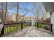 A wood deck overlooks a well-manicured backyard with a shed at 11908 W Aqueduct Dr, Littleton, CO 80127