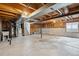 Unfinished basement offers lots of potential for customization and storage at 11908 W Aqueduct Dr, Littleton, CO 80127