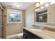 Bathroom featuring granite vanity, and glass enclosed shower at 444 S Larkspur Dr, Castle Rock, CO 80104