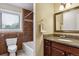 Bathroom with bathtub, granite vanity, and accent tiles in the shower at 444 S Larkspur Dr, Castle Rock, CO 80104