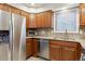 Kitchen featuring granite countertops, stainless steel appliances and wooden cabinets at 444 S Larkspur Dr, Castle Rock, CO 80104