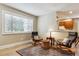 Inviting living room with hardwood floors, a large window, and stylish furnishings at 444 S Larkspur Dr, Castle Rock, CO 80104