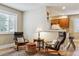 Inviting living room with hardwood floors, a large window, and stylish furnishings at 444 S Larkspur Dr, Castle Rock, CO 80104