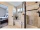 Bathroom features a tub and shower at 6454 S Swadley Way, Littleton, CO 80127