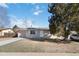 Classic single-level home featuring a matching garage, a spacious front yard, and a well-kept lawn at 3270 W 134Th Ave, Broomfield, CO 80020