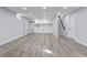Finished basement with cabinets, sink, and a staircase to the upper floors at 951 E 10Th Ave, Broomfield, CO 80020