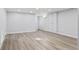 Finished basement featuring light gray walls, light brown floors and rec space with utility closet at 951 E 10Th Ave, Broomfield, CO 80020