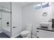Updated bathroom with a glass shower and a modern vanity at 951 E 10Th Ave, Broomfield, CO 80020
