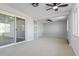 Spacious bonus room with sliding glass doors and ample natural light at 951 E 10Th Ave, Broomfield, CO 80020