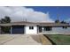 Single-story home with garage, modern front door and rock landscaping at 951 E 10Th Ave, Broomfield, CO 80020