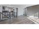Open-concept floorplan features kitchen and living spaces on a split level at 951 E 10Th Ave, Broomfield, CO 80020