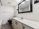 Clean bathroom with a vanity and shower/tub combo at 1250 N Humboldt St # 1002, Denver, CO 80218