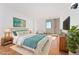 Spacious bedroom with hardwood floors and large window at 1250 N Humboldt St # 1002, Denver, CO 80218