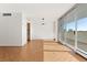 Dining area with hardwood floors and access to balcony at 1250 N Humboldt St # 1002, Denver, CO 80218