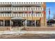 Building entrance with awning, and flags at 1250 N Humboldt St # 1002, Denver, CO 80218