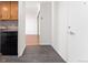 View of entryway, kitchen, and sliding door to living room at 1250 N Humboldt St # 1002, Denver, CO 80218