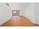 Hardwood floors and large windows fill this living room with light at 1250 N Humboldt St # 1002, Denver, CO 80218