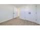 Bright bedroom with closet and new vinyl plank flooring at 1005 Elmer Dr, Northglenn, CO 80233