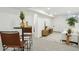 Finished basement features a cozy living area with stylish furniture, ideal for relaxation and entertainment at 4465 N Umatilla St, Denver, CO 80211