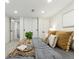 Inviting main bedroom with plush bedding, modern decor, and ample closet space for a comfortable, serene retreat at 4465 N Umatilla St, Denver, CO 80211