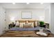 Serene main bedroom showcases a plush bed, stylish decor, and soft lighting for a restful retreat at 4465 N Umatilla St, Denver, CO 80211