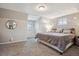 Another view of the carpeted main bedroom featuring natural light and neutral walls at 1320 Quari St, Aurora, CO 80011