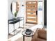 Modern foyer with sleek console table, round mirror, and stylish front door at 2435 S Meade St, Denver, CO 80219