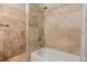 Bathroom featuring a shower and bathtub at 7755 E Quincy Ave # 308A5, Denver, CO 80237