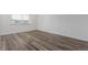 Spacious bedroom offering wood floors and a well-lit atmosphere at 7755 E Quincy Ave # 308A5, Denver, CO 80237
