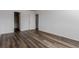 Bedroom featuring a closet and wood floors at 7755 E Quincy Ave # 308A5, Denver, CO 80237