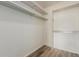 Walk-in closet featuring shelving at 7755 E Quincy Ave # 308A5, Denver, CO 80237