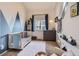 Brightly painted bedroom with decoratively painted walls and a patterned rug at 10743 W Berry Pl, Littleton, CO 80127