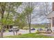 Street view of a home with mature trees at 10743 W Berry Pl, Littleton, CO 80127