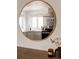 A reflection of kitchen features stainless steel appliances and a decorative tile backsplash at 1200 S Patton Ct, Denver, CO 80219