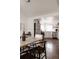 View of the kitchen showcasing stainless steel appliances and white subway tile backsplash at 1200 S Patton Ct, Denver, CO 80219