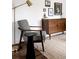 A cozy furniture set near hardwood floors and natural light at 1200 S Patton Ct, Denver, CO 80219