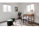 Well-lit office space with a modern desk, comfortable chair, and stylish decor at 1200 S Patton Ct, Denver, CO 80219