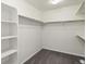 Well-organized walk-in closet with shelving and ample hanging space at 455 N Old Hammer St, Aurora, CO 80018